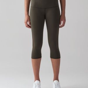 Lululemon Reveal Crop (15" inseam) in Dark Olive